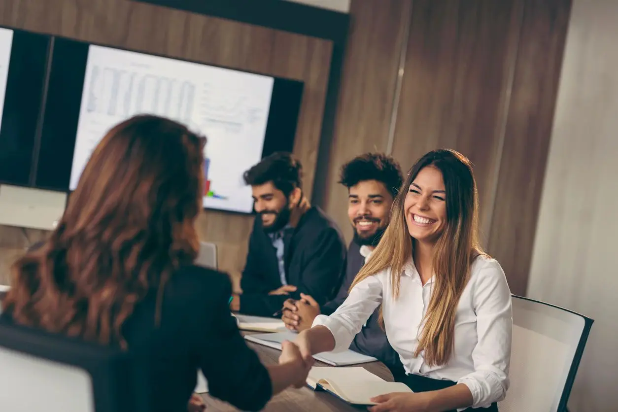 Professionals building workplace relationships through communication